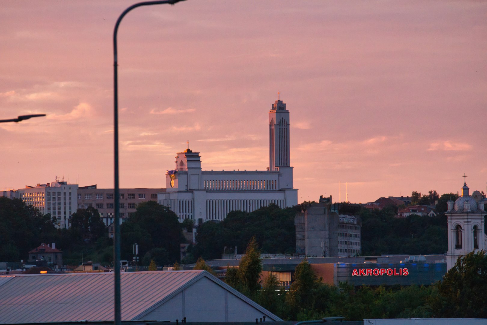 A photo of a church in the sunset